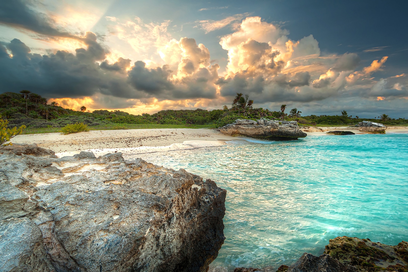 Caribbean beach in Mexico at sunset